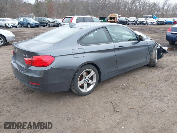 2014 BMW 4 Series 428i xDrive with VIN WBA3N9C50EK246002, listed as a IAAI auction lot 41612256 with 100,915 mi miles and . Bid and sale history available at carsss.com. Image 4.