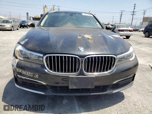 2018 BMW 7 Series 740i xDrive with VIN WBA7E4C57JGV23763, listed as a Copart auction lot 67151864 with 173,803 mi miles and Clean Title. Bid and sale history available at carsss.com. Image 5.