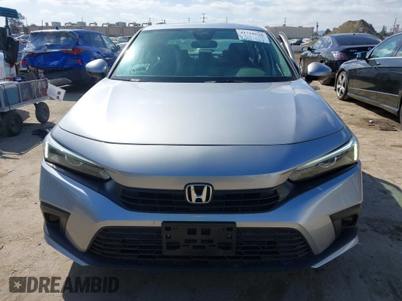 2022 Honda Civic Sedan EX with VIN 2HGFE1F79NH327295, listed as a IAAI auction lot 41718620 with 26,624 mi miles. Bid and sale history available at carsss.com. Image 12.