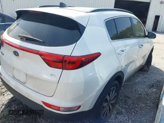 2018 Kia Sportage EX with VIN KNDPNCACXJ7321157, listed as a IAAI auction lot 41918274 with 157,813 mi miles and . Bid and sale history available at carsss.com. Image 4.