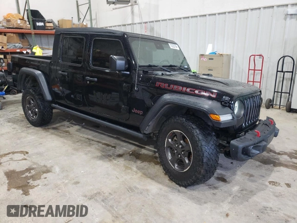 2020 Jeep Gladiator Rubicon with VIN 1C6JJTBG9LL183888, listed as a Copart auction lot 70225794 with 57,969 mi miles and Salvage title. Bid and sale history available at DreamBid. Image 4.