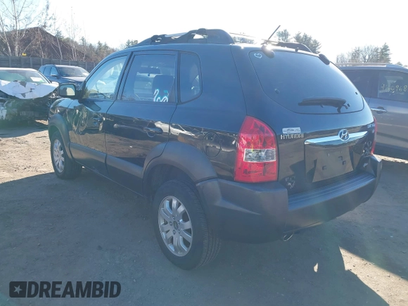 2007 Hyundai Tucson SE with VIN KM8JN72D17U590769, listed as a IAAI auction lot 41003503 with 143,462 mi miles and . Bid and sale history available at DreamBid. Image 3.