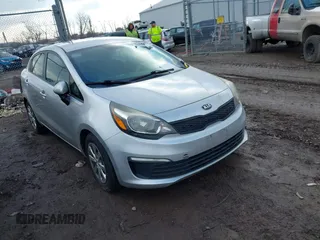 2016 Kia Rio LX with VIN KNADM4A34G6525329, listed as a IAAI auction lot 41660538 with 124,224 mi miles. Bid and sale history available at carsss.com. Image 1.