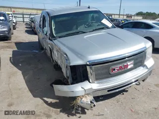 2010 GMC Sierra 1500 SLT with VIN 3GTRKWE33AG184581, listed as a IAAI auction lot 41741802 with 135,886 mi miles. Bid and sale history available at carsss.com. Image 1.