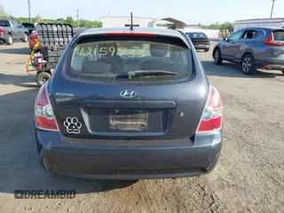 2007 Hyundai Accent SE z VIN KMHCN36CX7U032583, wystawiony jako IAAI lot #42159733 z przebiegiem 113 993 mil mil oraz . Historia ofert i sprzedaży dostępna na DreamBid. Obrazek 16.