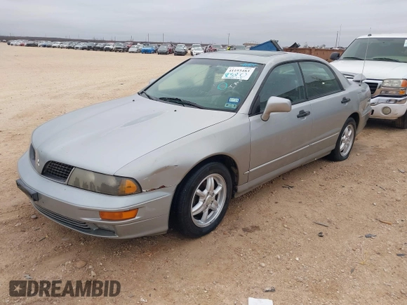2002 Mitsubishi Diamante z VIN 6MMAP87P82T022689, wystawiony jako IAAI lot #41193483 z przebiegiem 107 022 mil mil oraz . Historia ofert i sprzedaży dostępna na DreamBid. Obrazek 2.