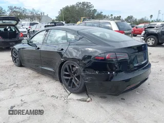 2023 Tesla Model S with VIN 5YJSA1E52PF500088, listed as a IAAI auction lot 41372918 with Not provided miles and . Bid and sale history available at DreamBid. Image 3.