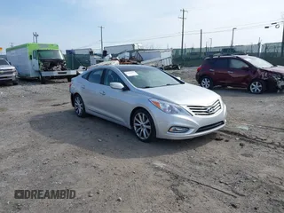 2013 Hyundai Azera with VIN KMHFH4JG9DA323254, listed as a IAAI auction lot 41776183 with 73,489 mi miles and . Bid and sale history available at DreamBid. Image 1.