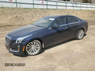 2019 Cadillac CTS Luxury AWD z VIN 1G6AX5SS1K0101825, wystawiony jako Copart lot #52970115 z przebiegiem 56 886 mil mil oraz Czysty tytuł • Clean title. Historia ofert i sprzedaży dostępna na DreamBid. Obrazek 1.