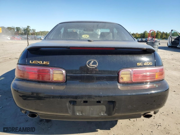 1997 Lexus SC 400 Luxury Sport Cpe with VIN JT8CH32Y5V0052465, listed as a Copart auction lot 74328664 with NaN miles and Salvage Title. Bid and sale history available at carsss.com. Image 6.