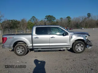 2021 Ford F-150 XL with VIN 1FTFW1E58MFA73753, listed as a IAAI auction lot 41707310 with 138,450 mi miles. Bid and sale history available at carsss.com. Image 13.