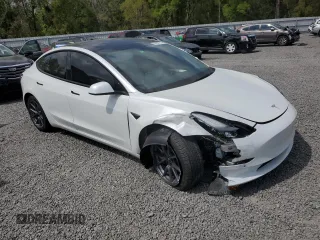 2022 Tesla Model 3 Long Range with VIN 5YJ3E1EB7NF342309, listed as a Copart auction lot 48282775 with 40,180 mi miles and Salvage Title. Bid and sale history available at DreamBid. Image 4.