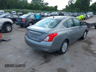 2012 Nissan Versa SV with VIN 3N1CN7AP7CL819956, listed as a IAAI auction lot 42578855 with 57,245 mi miles and . Bid and sale history available at DreamBid. Image 4.