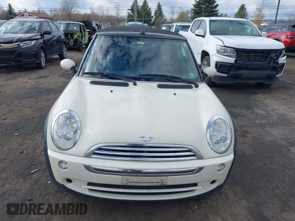 2006 MINI Convertible with VIN WMWRF33566TF65410, listed as a IAAI auction lot 40813052 with 131,109 mi miles and . Bid and sale history available at DreamBid. Image 12.