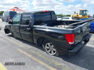 2005 Nissan Titan SE with VIN 1N6AA07A05N501283, listed as a IAAI auction lot 39151799 with 129,069 mi miles and . Bid and sale history available at DreamBid. Image 3.