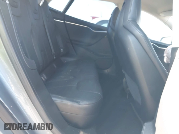 2014 Tesla Model S 60 with VIN 5YJSA1H1XEFP31911, listed as a IAAI auction lot 42029215 with Not Provided miles and . Bid and sale history available at DreamBid. Image 8.