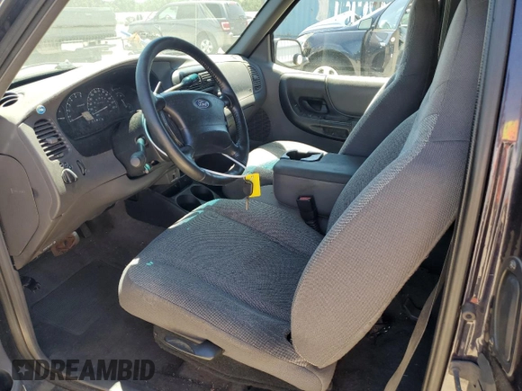 2001 Ford Ranger XL z VIN 1FTYR14V51PB60050, wystawiony jako Copart lot #61659485 z przebiegiem 202 324 mil mil oraz Czysty tytuł • Clean title. Historia ofert i sprzedaży dostępna na DreamBid. Obrazek 7.
