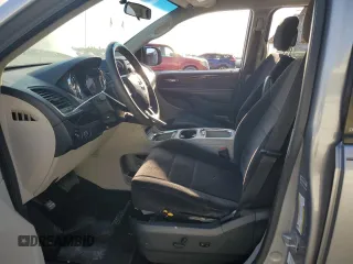 2014 Dodge Grand Caravan SXT with VIN 2C4RDGCG1ER121033, listed as a Copart auction lot 52030715 with 105,451 mi miles and Salvage Title. Bid and sale history available at DreamBid. Image 7.