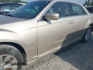 2012 Chrysler 300 with VIN 2C3CCAAG8CH261449, listed as a IAAI auction lot 42126170 with 189,961 mi miles and . Bid and sale history available at DreamBid. Image 6.