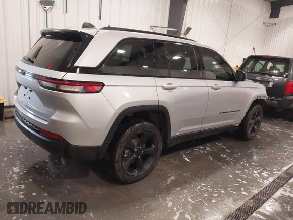 2023 Jeep Grand Cherokee Altitude with VIN 1C4RJHAGXP8882546, listed as a IAAI auction lot 41794805 with 17,071 mi miles and . Bid and sale history available at DreamBid. Image 4.