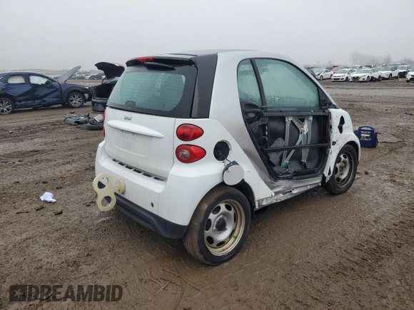 2015 Smart fortwo Passion z VIN WMEEJ3BA3FK791701, wystawiony jako Copart lot #86552704 z przebiegiem 27 313 mil mil oraz Szkoda całkowita • Salvage title. Historia ofert i sprzedaży dostępna na DreamBid. Obrazek 3.