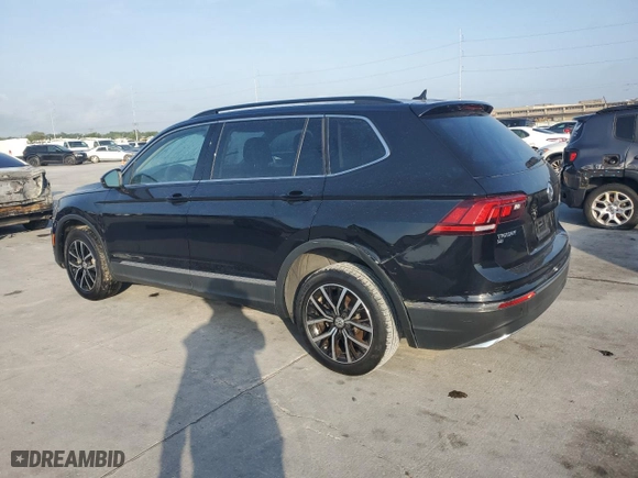 2021 Volkswagen Tiguan SE with VIN 3VV3B7AXXMM085722, listed as a Copart auction lot 54438285 with 76,746 mi miles and Clean Title. Bid and sale history available at carsss.com. Image 2.