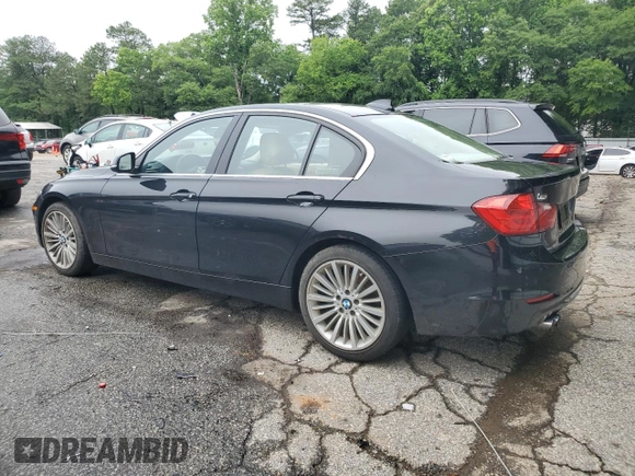 2014 BMW 3 Series 328i with VIN WBA3C1C5XEK105543, listed as a Copart auction lot 58548015 with 156,721 mi miles and Salvage title. Bid and sale history available at DreamBid. Image 2.