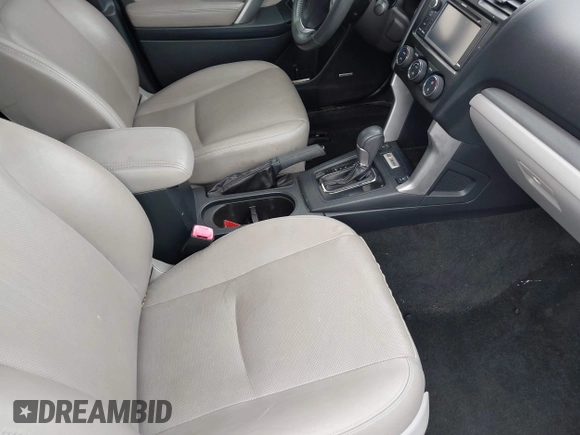 2015 Subaru Forester Touring with VIN JF2SJAWC9FH561581, listed as a IAAI auction lot 42237512 with 109,210 mi miles and . Bid and sale history available at DreamBid. Image 5.