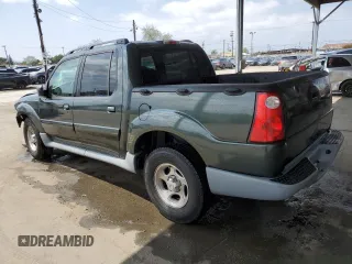2002 Ford Explorer Sport Trac Value with VIN 1FMZU67E72UC81009, listed as a Copart auction lot 54929835 with 130,862 mi miles and Salvage title. Bid and sale history available at DreamBid. Image 2.