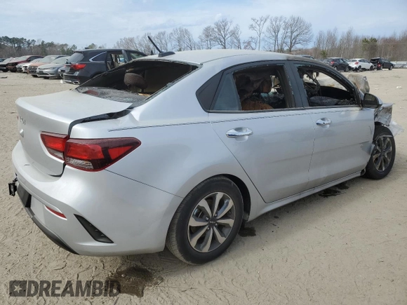 2023 Kia Rio S with VIN 3KPA24AD5PE590253, listed as a Copart auction lot 42056654 with 0 mi miles and Non Repairable. Bid and sale history available at carsss.com. Image 3.