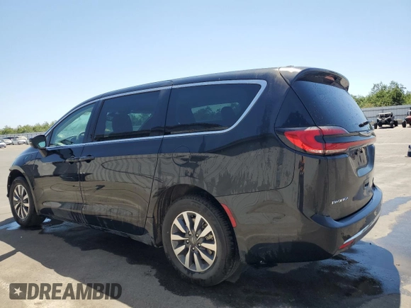 2023 Chrysler Pacifica Hybrid Touring L with VIN 2C4RC1L78PR632368, listed as a Copart auction lot 61763955 with 41,494 mi miles and Clean title. Bid and sale history available at DreamBid. Image 2.