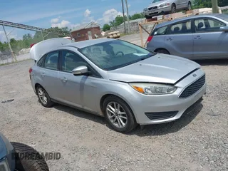 2015 Ford Focus SE with VIN 1FADP3F20FL372555, listed as a IAAI auction lot 42442665 with 84,318 mi miles and . Bid and sale history available at DreamBid. Image 1.