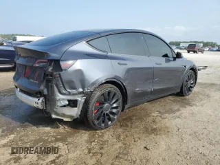 2022 Tesla Model Y Performance with VIN 7SAYGDEF4NF447462, listed as a Copart auction lot 58306595 with 61,671 mi miles and Non repairable. Bid and sale history available at DreamBid. Image 3.
