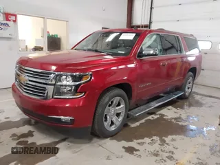 2015 Chevrolet Suburban LTZ z VIN 1GNSKKKC7FR218034, wystawiony jako IAAI lot #41884644 z przebiegiem 160 721 mil mil oraz . Historia ofert i sprzedaży dostępna na DreamBid. Obrazek 2.