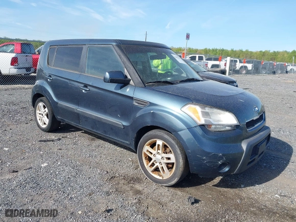 2011 Kia Soul + with VIN KNDJT2A28B7232900, listed as a IAAI auction lot 42093207 with 153,504 mi miles. Bid and sale history available at carsss.com. Image 1.