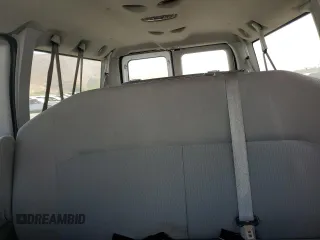 2014 Ford Econoline Passenger XL with VIN 1FBNE3BLXEDA14976, listed as a Copart auction lot 65948404 with 285,655 mi miles and Salvage Title. Bid and sale history available at DreamBid. Image 10.