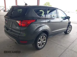 2019 Ford Escape SE with VIN 1FMCU0GD9KUB79835, listed as a IAAI auction lot 42014806 with 130,324 mi miles. Bid and sale history available at carsss.com. Image 4.