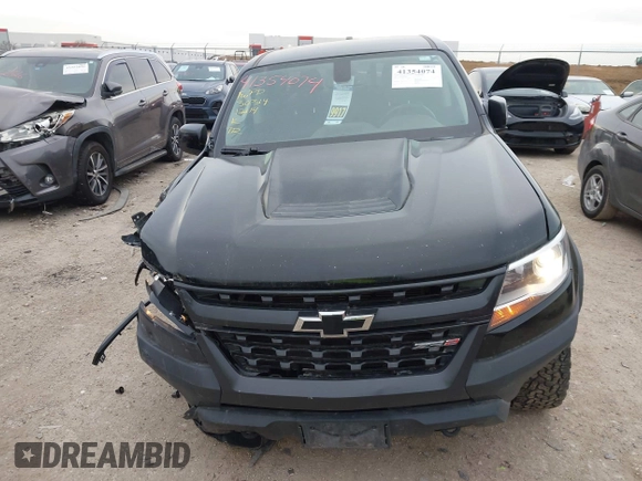 2018 Chevrolet Colorado 4WD ZR2 with VIN 1GCGTEENXJ1164617, listed as a IAAI auction lot 41354074 with 61,155 mi miles. Bid and sale history available at carsss.com. Image 12.