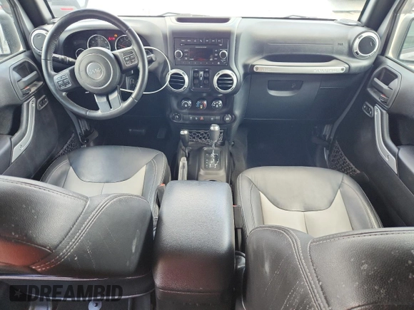 2016 Jeep Wrangler Unlimited Sahara with VIN 1C4BJWEG6GL168944, listed as a Copart auction lot 61650615 with 66,016 mi miles and Salvage title. Bid and sale history available at DreamBid. Image 8.