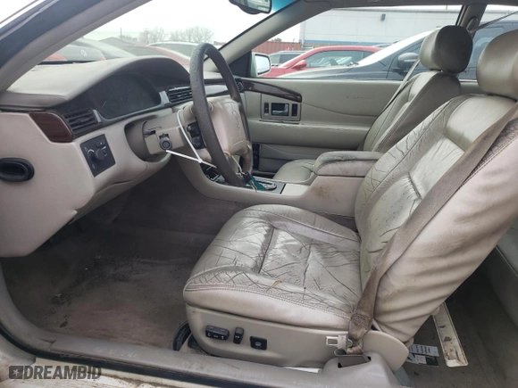 1999 Cadillac Eldorado with VIN 1G6EL12Y5XU600699, listed as a Copart auction lot 88164505 with 140,075 mi miles and Salvage Title. Bid and sale history available at carsss.com. Image 7.