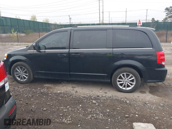 2019 Dodge Grand Caravan SXT with VIN 2C4RDGCG6KR749505, listed as a IAAI auction lot 42087083 with 167,551 mi miles and . Bid and sale history available at DreamBid. Image 14.