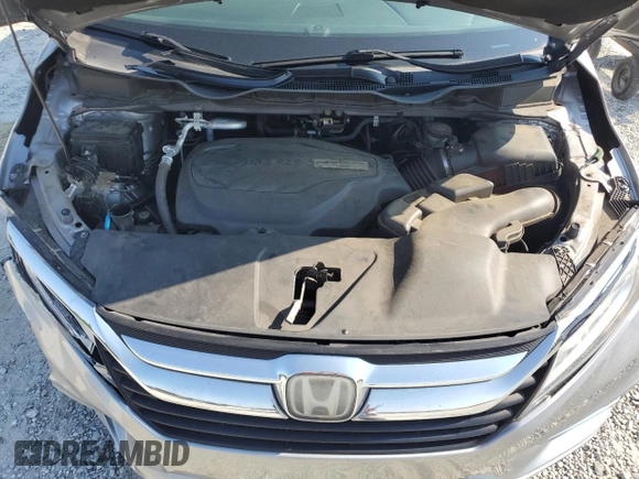 2018 Honda Odyssey Elite with VIN 5FNRL6H95JB062033, listed as a Copart auction lot 63732915 with 105,234 mi miles and Salvage title. Bid and sale history available at DreamBid. Image 12.