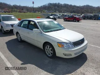 2001 Toyota Avalon XL w/Bucket Seats with VIN 4T1BF28B61U169213, listed as a IAAI auction lot 41829245 with 99,940 mi miles. Bid and sale history available at carsss.com. Image 1.