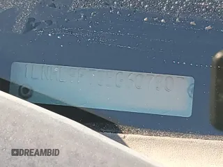 2014 Lincoln MKS EcoBoost z VIN 1LNHL9FT8EG607807, wystawiony jako Copart lot #57755915 z przebiegiem 203 316 mil mil oraz Szkoda całkowita • Salvage title. Historia ofert i sprzedaży dostępna na DreamBid. Obrazek 12.