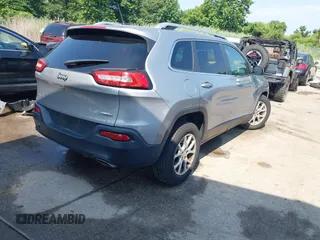 2015 Jeep Cherokee Latitude with VIN 1C4PJMCS2FW789144, listed as a IAAI auction lot 42837222 with 99,759 mi miles and . Bid and sale history available at DreamBid. Image 4.