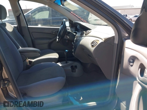 2004 Ford Focus SE with VIN 1FAFP34394W152606, listed as a IAAI auction lot 41833454 with 287,290 mi miles and . Bid and sale history available at DreamBid. Image 5.