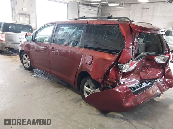2012 Toyota Sienna LE AAS with VIN 5TDKK3DC5CS277303, listed as a IAAI auction lot 42162586 with 128,656 mi miles and . Bid and sale history available at DreamBid. Image 3.