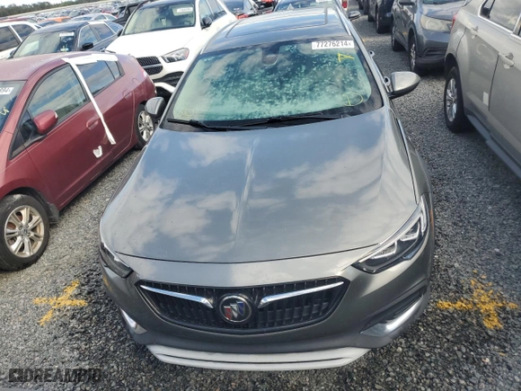 2019 Buick Regal TourX Essence with VIN W04GV8SX0K1013461, listed as a Copart auction lot 77276214 with NaN miles and Salvage Title. Bid and sale history available at carsss.com. Image 5.