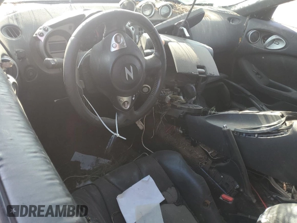 2010 Nissan 370Z Touring z VIN JN1AZ4EH5AM500829, wystawiony jako Copart lot #52824135 z przebiegiem Nie podano mil oraz Szkoda całkowita • Salvage title. Historia ofert i sprzedaży dostępna na DreamBid. Obrazek 8.