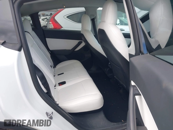2022 Tesla Model Y Long Range z VIN 7SAYGDEE6NF419332, wystawiony jako IAAI lot #42020974 z przebiegiem 55 680 mil mil oraz . Historia ofert i sprzedaży dostępna na DreamBid. Obrazek 8.